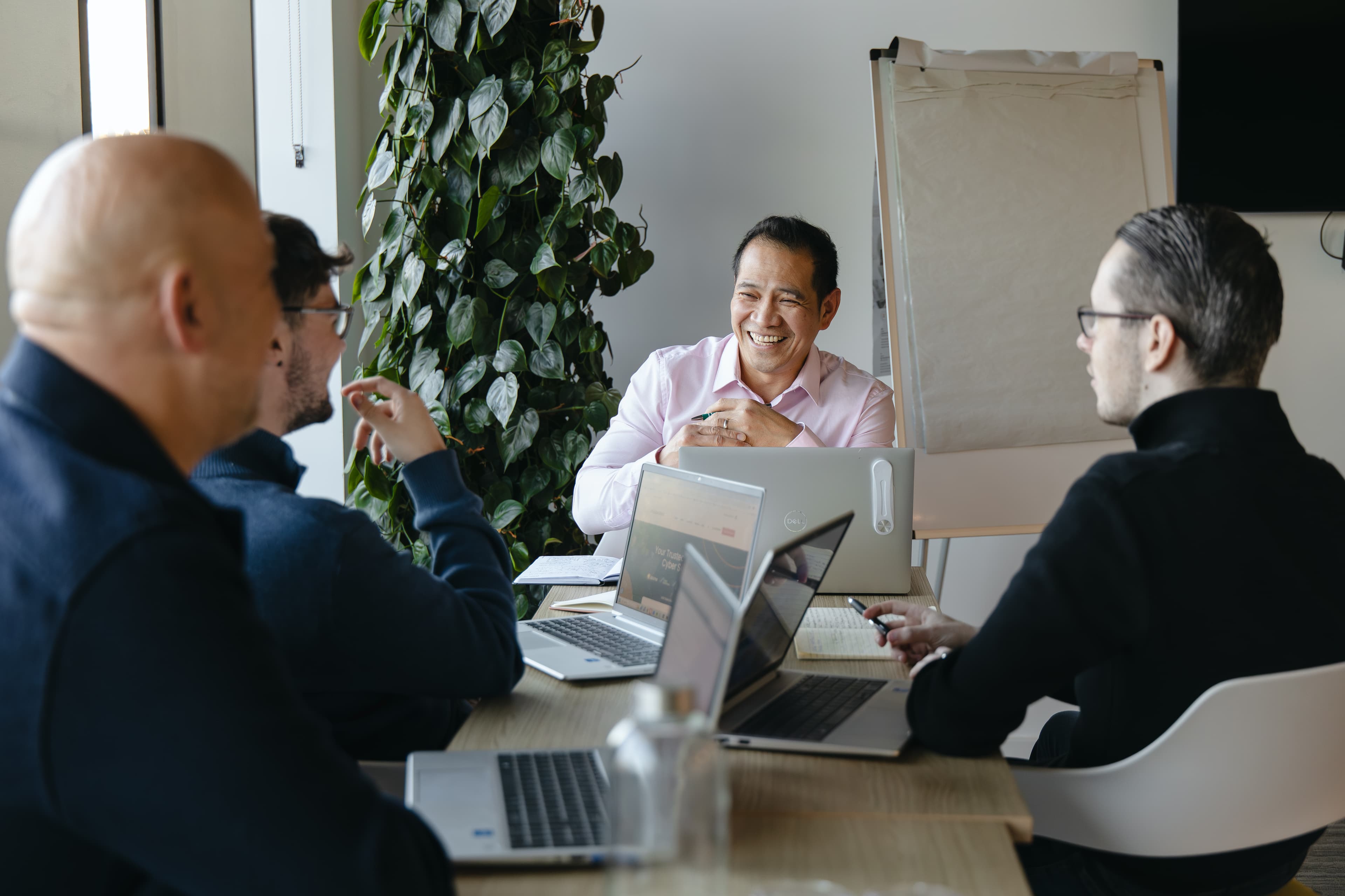 Cyber Trust team discussing a client's cyber hygiene